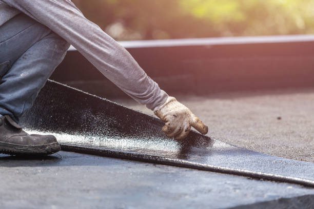 Professional Basement Waterproofing technician working in Naples, NY
